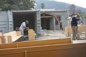 Heroic on-site refinishing of Saint Anne's pews