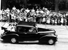 StateLibQld 1 213884 Queen Elizabeth II and Prince Philip wave to the crowds from a Humber car during their visit to Brisbane in 1954.jpg