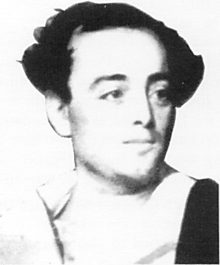 A black and white photograph of a young man