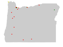 Outline of map of Oregon with colored dots representing the location of Superfund sites in the state