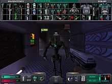 An in-game System Shock 2 gameplay screenshot, showcasing the interaction menus. A hand is holding a silver pistol while the mouse is pointed at an unknown robotical being, while on top of the screenm several minor objects are shown organised as in inventory.