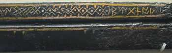 Middle section of a seax, showing inlaid wire decoration