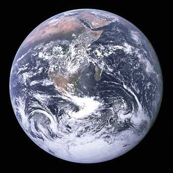 "The Blue Marble" photograph of Earth, taken by the Apollo 17 lunar mission. The Arabian peninsula, Africa and Madagascar lie in the upper half of the disc, while Antarctica is at the bottom.