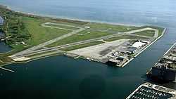 airport runways on island surrounded by water