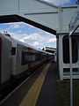 Train on the rails, Rowlands Castle railway station.JPG