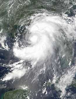 Tropical Storm Barry viewed from Space on August 6, 2001. The storm is approaching the Florida Panhandle. At the bottom of the image is the Yucatan Peninsula, while Cuba is seen on the right. The image is focused on the Gulf of Mexico.