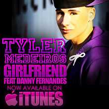 A teenage boy wearing a backwards baseball cap and purple hoodie graces the cover from the right-side while the left-side shows the words "Tyler Medeiros" and "Girlfriend Feat Danny Fernandes" written in purple capital letters with the words "Now Available On iTunes" showing below it with the Apple logo on the left-side.