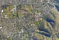 Aerial view of wetland surrounded by suburbs