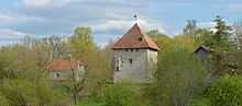 Vao castle, with the protruding latrine visible on the left side of the building.