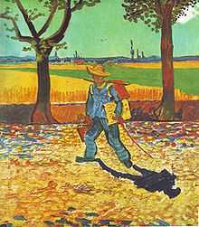 man wearing a straw hat, carrying a canvas and paintbox, walking to the left, down a tree lined, leaf strewn countryroad