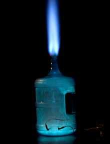 Container of ethanol vapour mixed with air, undergoing rapid combustion