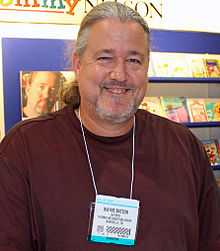 A headshot of Wayne Thomas Batson.