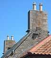 Witches' stones on tiled roof Jersey 3.jpg