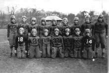 Group photograph of boys in football uniforms