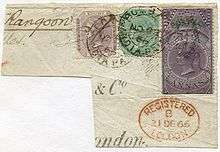 Envelope with postmarks and three different stamps