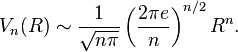 V_n(R) \sim \frac{1}{\sqrt{n\pi}}\left(\frac{2\pi e}{n}\right)^{n/2}R^n.