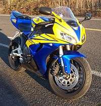 Blue and yellow 2006 Honda CBR1000RR