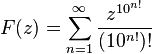 F(z)=\sum_{n=1}^\infty\frac{z^{10^{n!}}}{(10^{n!})!}