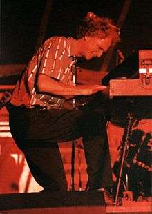 Pratt playing a keyboard