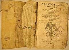 Front cover of book, titled "Aristotelis Logica", with an illustration of eagle on a snake