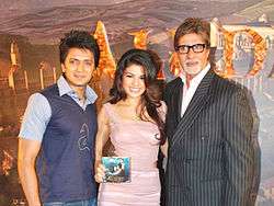 A photograph of Jacqueline Fernandez, Amitabh Bachchan and Riteish Deshmukh at an event for the film Aladin.