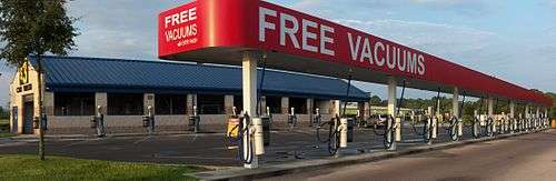 Automotive vacuums in Bayonet Point, Florida. Although the sign says "free", a paid car wash is required first.