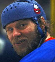 Butch Goring in an Islanders helmet.