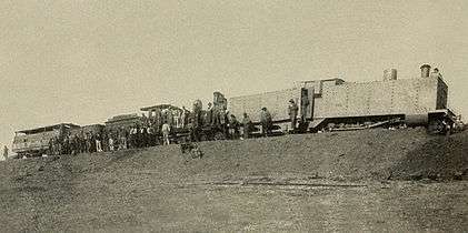 Photo of an armoured CGR 3rd Class 4-4-0 1889 locomotive derailed on 12 October 1899 during the first engagement of the Second Boer War at Kraaipan