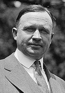 Upper-body portrait of an early-twentieth-century man in a suit.