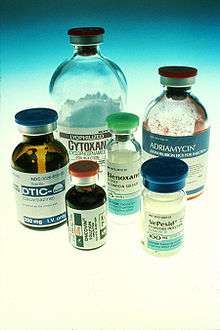 Six medicine bottles.