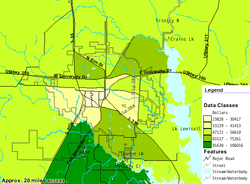 Map diagram showing median family income levels in Denton County. The southern area has a median family income in the $91,630 to $106,016 range. The northern area has a median range between $65,517 and $75,261. Downtown area has the lowest range at $23,828 to $41,453.