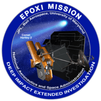 A circle with a blue border encloses an image of a spacecraft on approach to a comet. The words "EXPOXI Mission" and "Deep Impact Extended Investigation" are written along the border of the image.