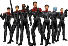 Seven characters wearing armored versions of the Star Trek: Voyager uniforms and carrying a variety of futuristic weaponry. Among their number are two women and a blue-skinned alien.