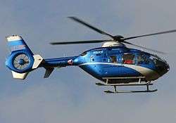 Blue-and-gray police helicopter