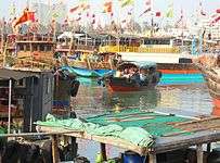 Haikou New Port - ship's tender with passengers 01.jpg