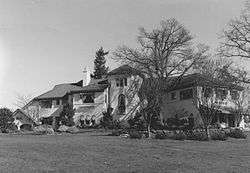 Photograph of the Hall–Chaney House across a broad lawn.