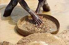 A man panning for diamonds