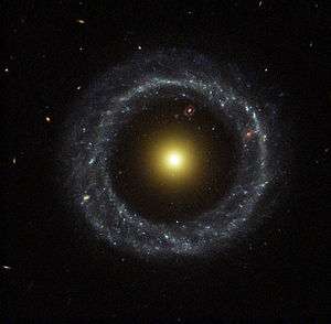 The yellow nucleus of Hoag's Object surrounded by a blue ring of stars