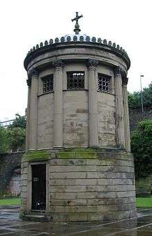 Small circular stone building