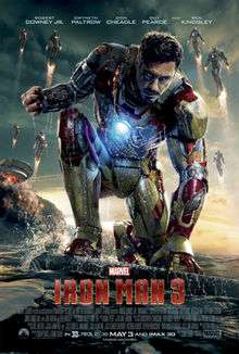 Tony, as Iron Man in his battle damaged suit sitting with water around him, while his house behind is destroyed. Stark's Iron Legion is flying, while the Marvel logo with the film's title, credits and release date are below.