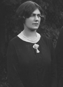 Black and white image of Joan Lindsay, posed in a black blouse