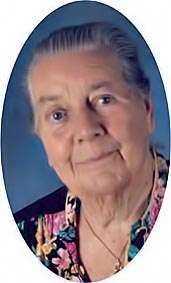 photo portrait of Johanna Budwig, an elderly lady with gray hair and a floral dress