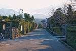 Small street lined by walls.