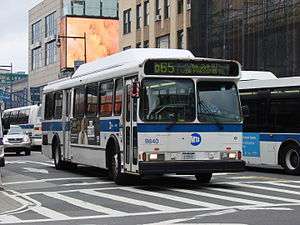 A bus in Q65 service in Queens