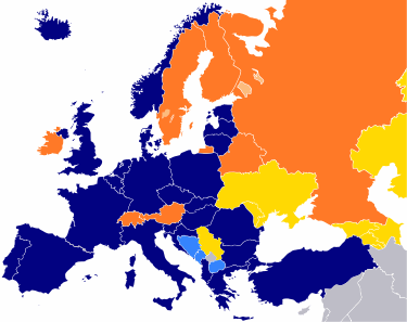 A map of Europe with countries in blue, cyan, orange, and yellow based on their NATO affiliation.