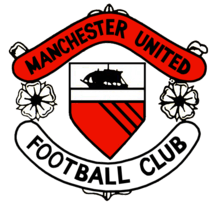 A football crest. In the centre is a shield with a ship in full sail above a red field with three diagonal black lines. Either side of the shield are two stylised roses, separating two scrolls. The upper scroll is red and reads "Manchester United" in black type, while the lower scroll is white with "Football Club" also written in black.