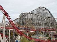 An overview of the Mean Streak roller coaster in the background with the Maverick roller coaster in the foreground