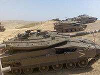 Merkava Mark IV (foreground)