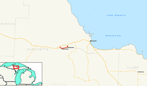 A map of Marquette County in the Upper Peninsula of Michigan and the surrounding area. There is a line on the map showing the route of M-28 running west to east, and a red line running to the south of it showing the route of Business M-28.