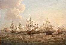 The painting focuses on the morning after the battle when British ships surrounded the fleeing Spanish fleet. The scene is bathed in a golden glow of early morning light. The British flagship is in the centre, indicated by the flag flying from the mainmast. She is at the head of a line of British ships, shown in the act of capturing the Spanish squadron in the middle centre. Land can be seen in the distance on the left.